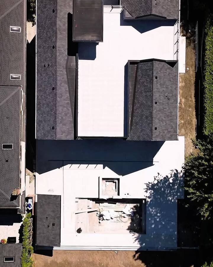 Aerial view of a home and backyard during concrete work in Tsawwassen